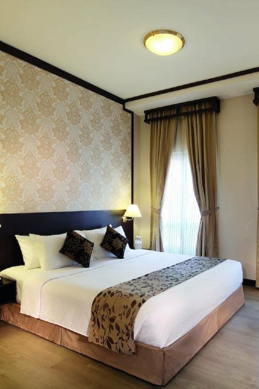 Village Court By Far East Hospitality Hotel